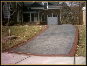 Stamped London Cobble Driveway with Brick Border